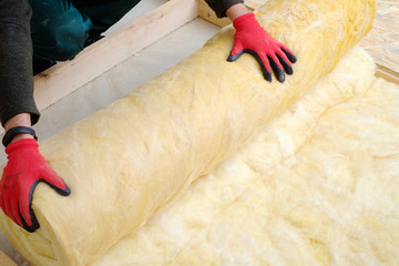 Work composed of mineral wool insulation in the floor, floor heating insulation , warm house,...