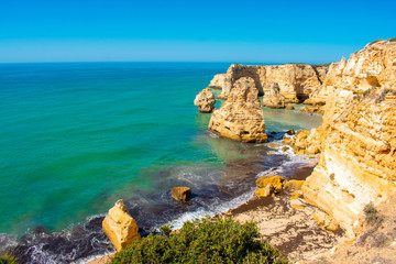 Praia de Marinha most Iconic Beach and Popular Landmark in Lagoa, Algarve Portuga. Beautiful landscape on coast of Atlantic Ocean 