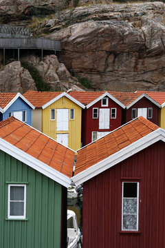 Decorative cabins in harbor on the coast of Sweden