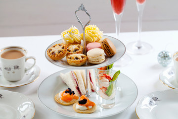 Christmas afternoon tea with turkey and cranberry sandwiches, crayfish cocktails, salmon bilinis, mince pies, cupcakes and macaroons