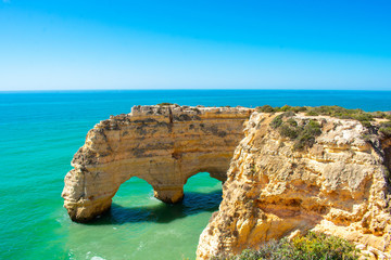 Praia de Marinha most Iconic Beach and Popular Landmark in Lagoa, Algarve Portuga. Beautiful landscape on coast of Atlantic Ocean 