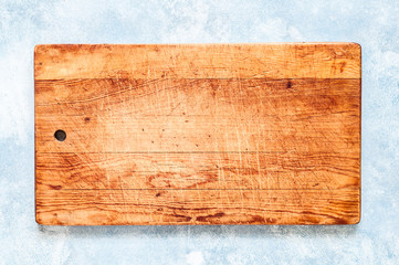Old Chopping Board on  Blue Background