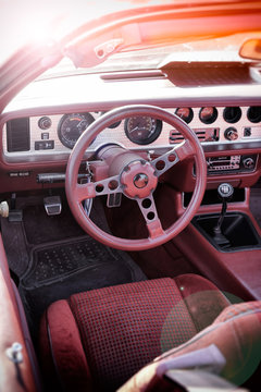 Who drove the red sports car?