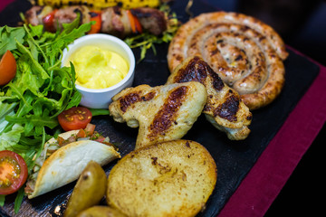 Tasty delicious set of beef, meat, sauce, vegetables, salat and sauce