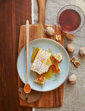 Honeycomb and honey on a plate