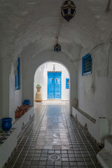 blue door and tunnel in Sidi Bou Said, Tunisia, Africa