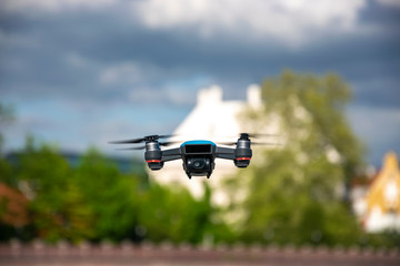 Drone quad copter with high resolution digital camera on the sky