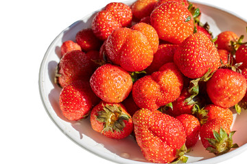 Ripe strawberries on white background