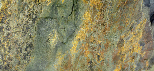 Rust stone wall or grunge, natural pattern, bronze wall, lighting abstract texture background design layout..