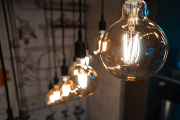 Close up round light bulbs in a vintage room.