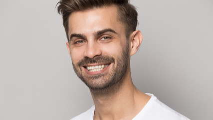 Fototapeta premium Closeup portrait young man with white toothy smile