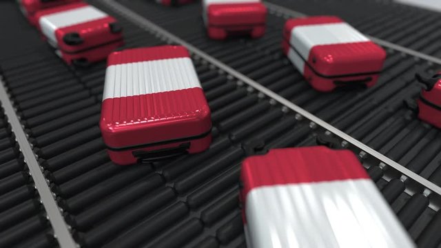 Many travel suitcases featuring flag of Peru on roller conveyer. Peruvian tourism conceptual animation