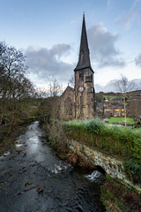 Fototapeta na wymiar River Ryburn flows through the villages of Rishworth, Ripponden and Triangle before flowing into the River Calder at Sowerby Bridge, Yorkshire, UK.