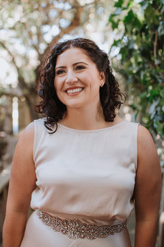 Portrait of Beautiful Bride in Silk Dress