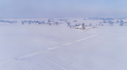 Fototapeta na wymiar Snowy morning in Amish Farmland