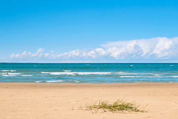 Landscape of Baltic Sea with sandy beach and sky