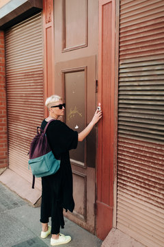 Lesbian Woman Ringing Entrance Door