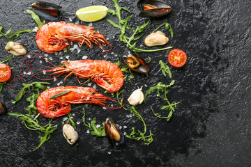 Tasty shrimps with mussels on dark background