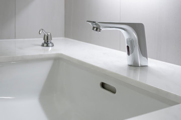 Modern faucet with marble washbasin sink interior contemporary