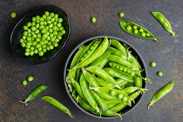 young green peas in bowl and Pods peas