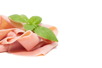 slices of cooked ham or isolated sausage