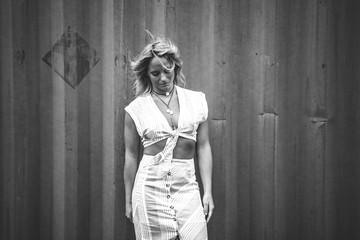 Fototapeta premium Blonde Model Showing Midriff in a Croptop 