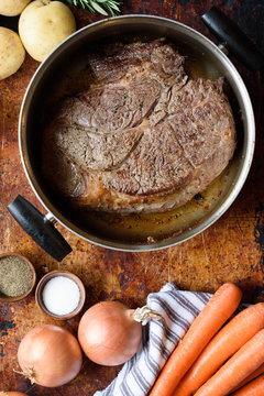 Chuck Roast browned before being cooked in a slow cooker