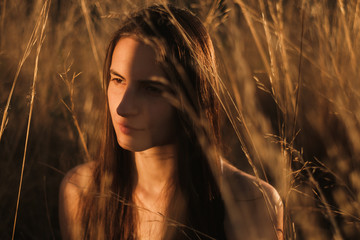 Close Up Of A Brunette Woman With Shadow On Her Face