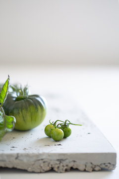 Green tomatoes with leaves