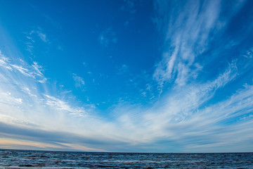 Obraz premium blue sky with white clouds over countryside landscape