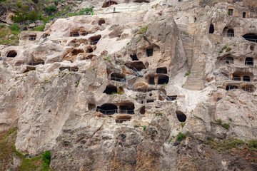 View of Vardzia caves. Vardzia is a cave monastery site in southern Georgia, excavated from the slopes of the Erusheti Mountain on the left bank of the Kura River