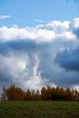 Obraz premium blue sky with white clouds over countryside landscape