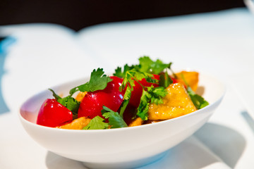 Chinese cuisine. fresh tomatoes and fried eggplant.