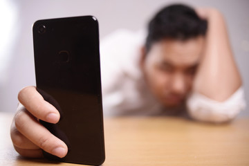 Sad Man With Smart Phone Worried Expression