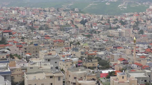 Skyline of Umm El Fahm, an Arab town with citizens of Israel. Umm al-Fahm is the social, cultural and economic center for residents of the Wadi Ara and Triangle regions.