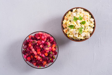 Traditional Russian salad olivier andvinaigrette