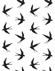 Vector seamless pattern of flying swallow bird silhouette isolated on white background 