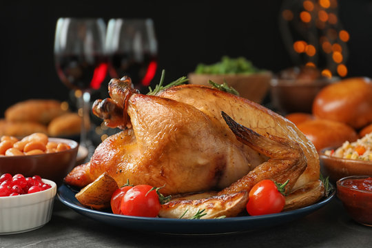 Traditional festive dinner with delicious roasted turkey served on table
