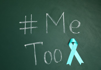 Teal ribbon and phrase #METOO written on green chalkboard, top view