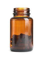 Bottle with vitamin capsules on white background