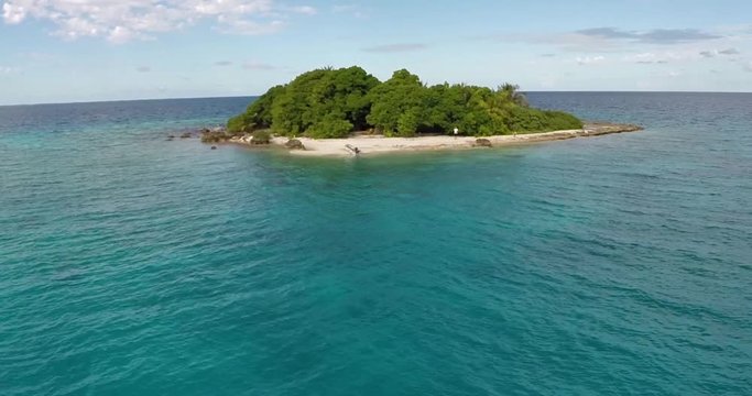 Aerial flyover of island in south pacific french tahiti rangiroa 4k