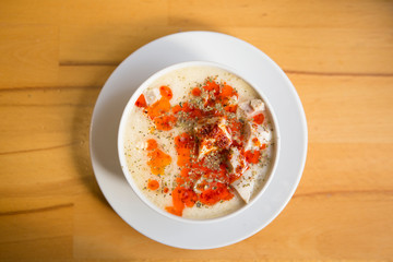 tripe soup bowl on wood table