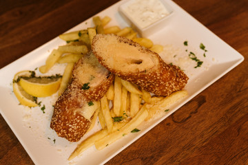  Chicken breast and French fries at the restaurant