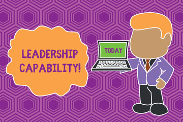 Text sign showing Leadership Capability. Business photo showcasing what a Leader can build Capacity to Lead Effectively Standing professional businessman holding open laptop right hand side
