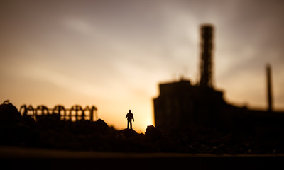 Creative artwork decoration. Chernobyl nuclear power plant at night. Layout of abandoned Chernobyl station after nuclear reactor explosion.