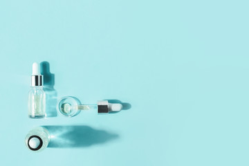 Hyaluronic acid, botulin, serum in vials. Concept of cosmetic surgery for facial rejuvenation.