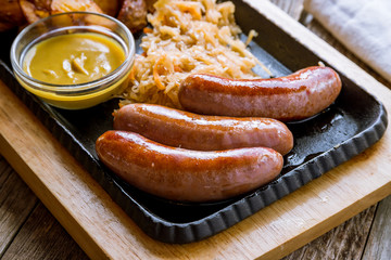 fried pork sausages on the Board