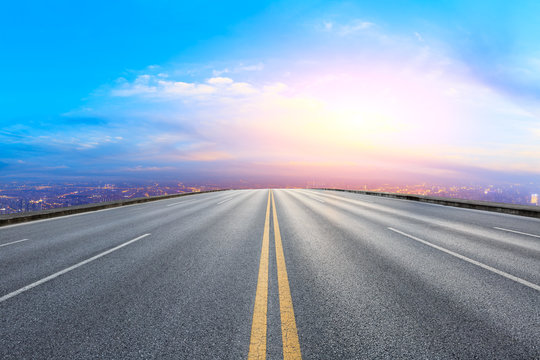 Empty highway road and modern city skyline in Shanghai,China