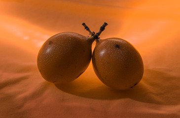 Granadilla Fruit on orange background