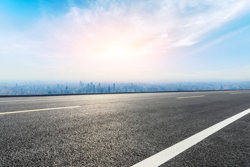 Empty highway road and modern city skyline in Shanghai,China